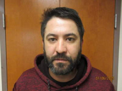 Adam Christopher Caesare Flores a registered  of New Mexico