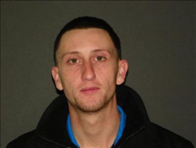 Justin Travis Mudgett a registered  of Massachusetts