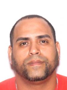 Reggie Lee Cruz a registered Sexual Offender or Predator of Florida