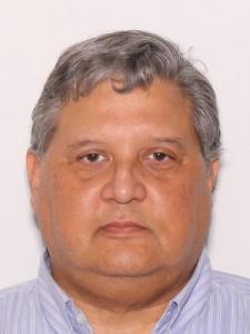 Julio Ernesto Sibauste a registered Sexual Offender or Predator of Florida