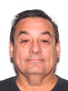 Gino German Camacho Beltran a registered Sexual Offender or Predator of Florida