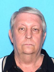 Exum Dudley Walker a registered Sexual Offender or Predator of Florida