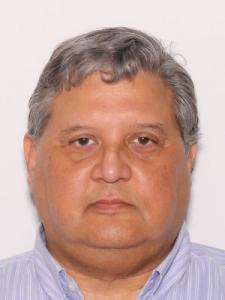 Julio Ernesto Sibauste a registered  of Florida