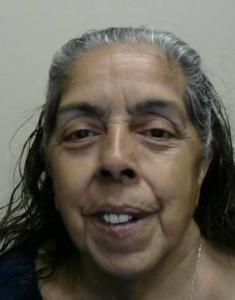 Santa Martinez Hassett a registered Sexual Offender or Predator of Florida