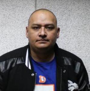 Juan Iniguez a registered  of Colorado