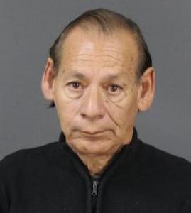 Robert Flores Alcantar a registered  of Colorado