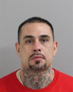 Zachary Desantos a registered  of Colorado