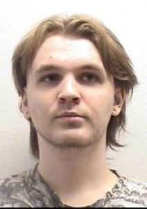 Kyron Justice Tuetken a registered  of Colorado