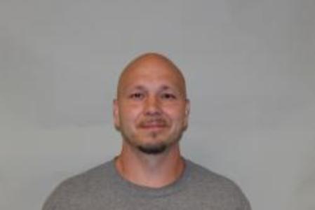 Travis M Okon a registered  of Wisconsin