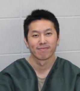 Por Chao Xiong a registered  of Wisconsin