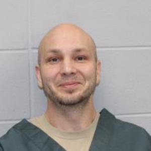 Travis M Okon a registered  of Wisconsin