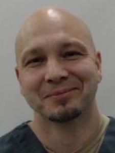 Travis M Okon a registered  of Wisconsin