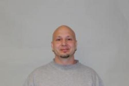 Travis M Okon a registered  of Wisconsin