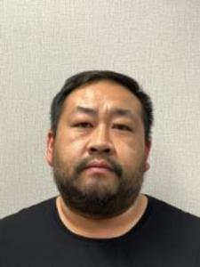 Cheng Moua a registered  of Wisconsin