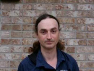 William L Combs a registered  of Wisconsin