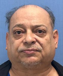 Benny Holguin a registered  of Texas