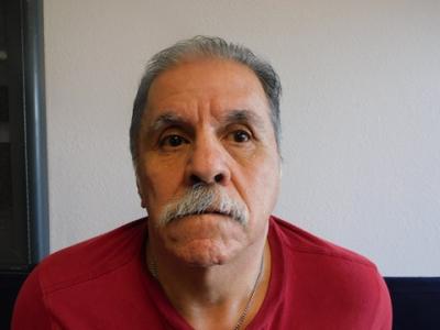 Oscar Bueno a registered  of Texas