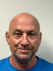 John E Aslin a registered  of Texas
