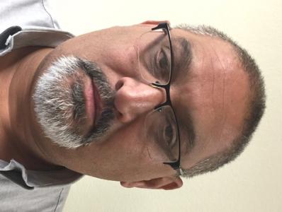 Rudy Garza a registered  of Texas