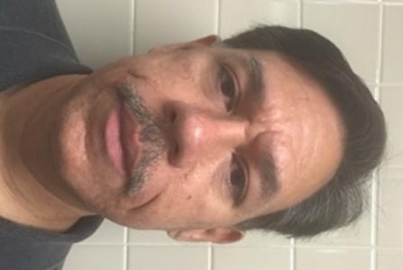 Johnny Frank Holguin a registered  of Texas