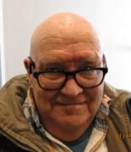 James E Chism a registered  of Illinois