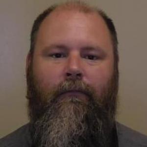 Justin J E Cooper a registered  of Illinois