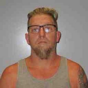 Justin A Fajen a registered  of Illinois