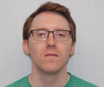 Adam M Rhodes a registered  of Illinois