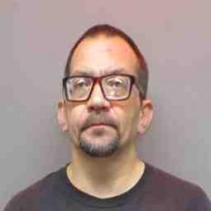 Michael Kuzmanich a registered  of Illinois