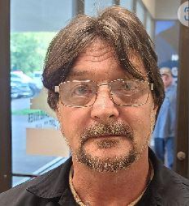 George L Nichols a registered  of 