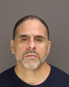 Alberto Guzman a registered  of New York