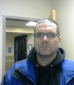 Aaron James Olson a registered  of North Dakota