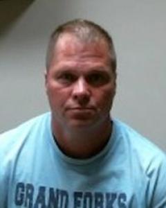 Travis Lee Lauckner a registered  of North Dakota