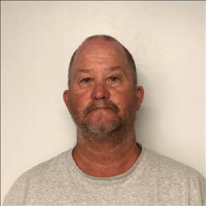 John Shambodie Packard a registered Sex, Violent, or Drug Offender of Kansas