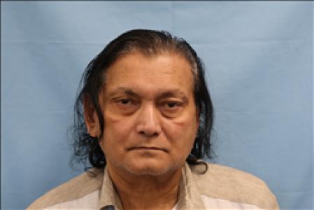 Mukesh Rasiklal Modi a registered Sex, Violent, or Drug Offender of Kansas