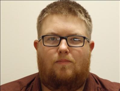 Tyler Graham Henderson a registered Sex, Violent, or Drug Offender of Kansas