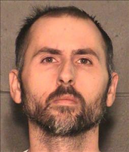 Travis Scott Layne a registered Sex, Violent, or Drug Offender of Kansas