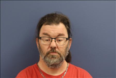 Tike Scott Surber a registered Sex, Violent, or Drug Offender of Kansas