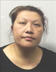 Tria Moua a registered  of Kansas