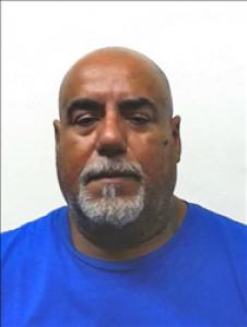 Roberto Garcia Garza a registered  of Kansas