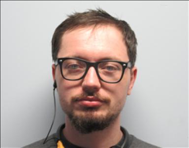 Justin Michael Sporing a registered Sex, Violent, or Drug Offender of Kansas