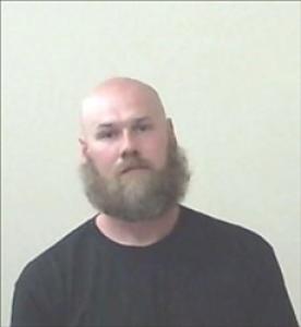 Justin Wayne Williams a registered  of Kansas