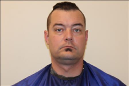Lucas Wayne Slusser a registered  of Kansas