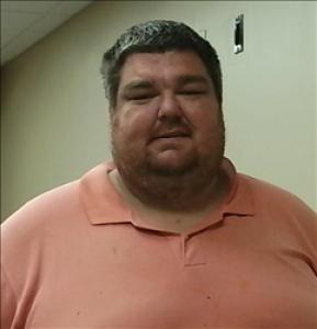 Justin James Benson a registered Sex, Violent, or Drug Offender of Kansas
