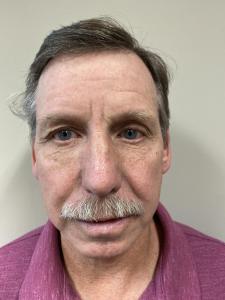 Andrew Harold Stoops a registered Sex or Violent Offender of Indiana