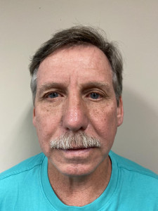 Andrew Harold Stoops a registered Sex or Violent Offender of Indiana