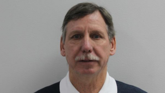 Andrew Harold Stoops a registered Sex or Violent Offender of Indiana