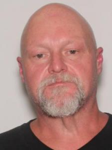 Olin M Lewis a registered Sexual Offender or Predator of Florida