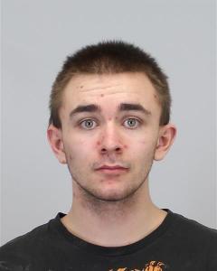 Nathan Gage Rhoades a registered Sex Offender of Wyoming