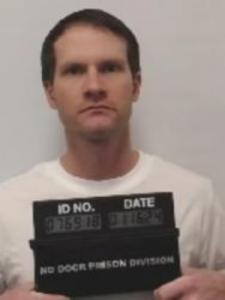 Kyle M Woodman a registered Sex Offender of North Dakota